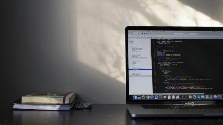 MacBook Pro screen showing code, representing connecting Claude Code to WordPress