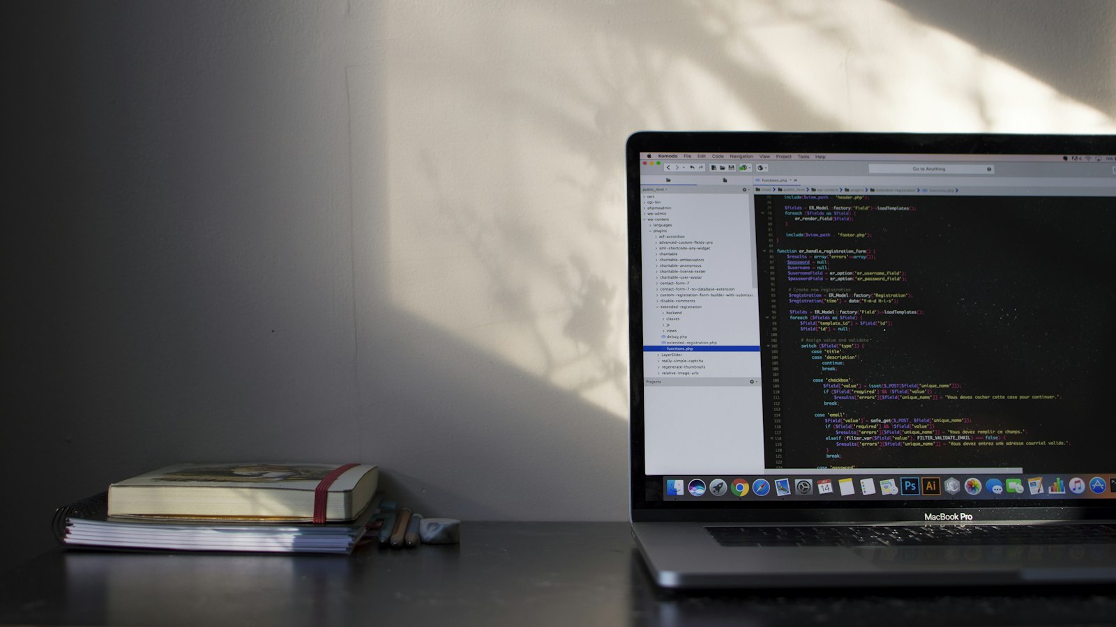 MacBook Pro screen showing code, representing connecting Claude Code to WordPress